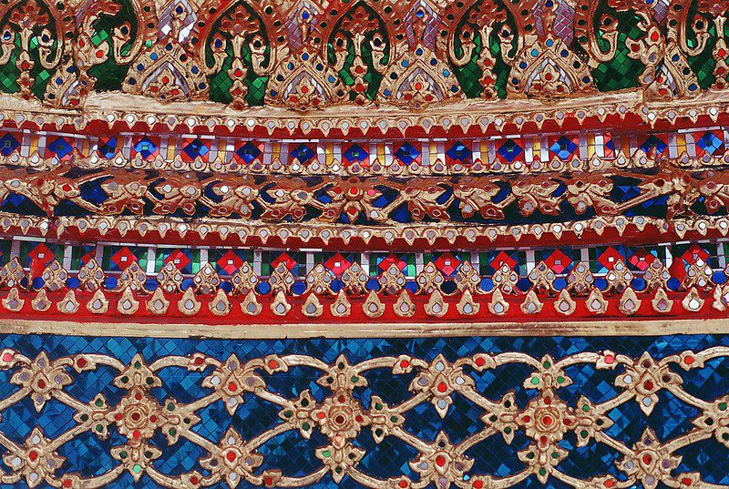 Sapphire blue and ruby red details noticed at wat phra kaew bangkok