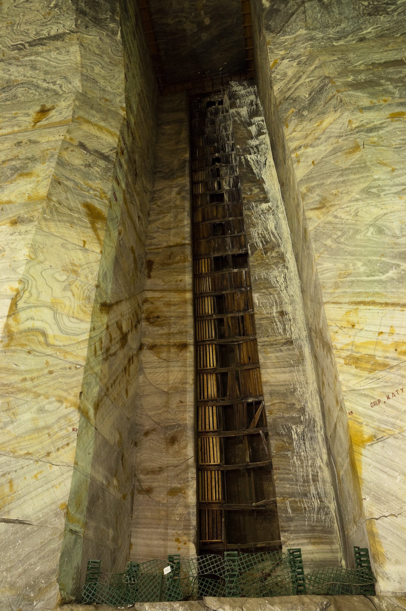 Vertical shaft in abandoned slanic salt mine in Romania