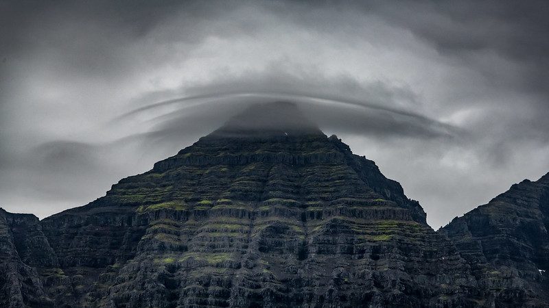 Strange lenticular cloud over Bulandstindur in Iceland