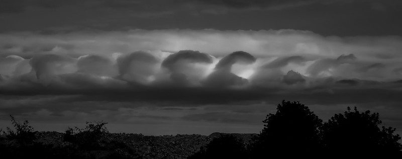 Rare kelvin helmholtz wave clouds over mallorca spain